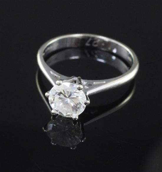 A modern 18ct white gold and solitaire diamond ring, size O/P.